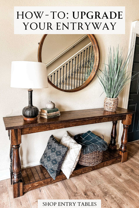 The entryway is the most important room in a house. It's the first thing you and your guests see when entering. Elevate your space with our entryway tables! Available in varying colors and sizes, we offer a variety that ensures everyone can find the perfect fit for their home. Shop our selection of entry tables to refresh your foyer! Entryway Table With Baskets Underneath, Western Entry Table Decor, Entryway Ideas Table, Long Entryway Ideas, Farmhouse Coffee Tables, Diy Entry Table, Stacking Books, Wall Stove, Seasonal Decor Fall