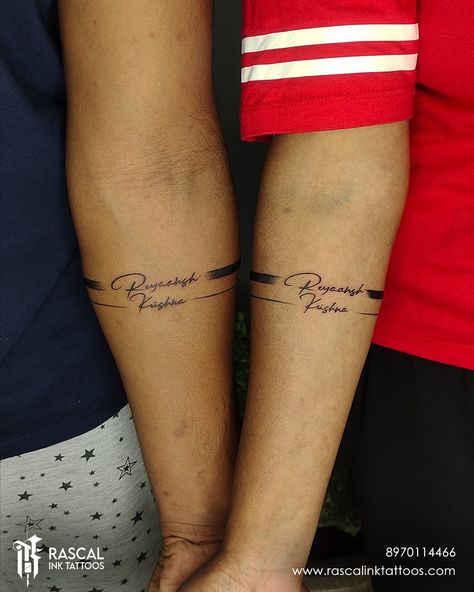 #couplearmbandtattoo #couplebandtattoo #couplebandtattoos #couplebandtattoodesign #bandtattoos #armbandtattoo #besttattoostudioinbangalore #besttattooshopinbangalore #besttattooshop #bangaloretattoostudio #bangaloretattooartist #bangaloretattooartists #besttattoowork #besttattooartists #rascalinktattoostudio #rascalinktattoos #tattoo #tattoos #tattoodesign Couple Arm Band Tattoos, Name Armband Tattoo, Band Tattoo With Name, Couple Name Tattoos, Tattoo Armband, Name Tattoo On Hand, Name Tattoos On Arm, Datum Tattoo, Tattoo Homme