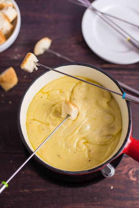 Cheese Fondue Recipe With Brandy or Cognac Emmental Cheese Recipes, Swiss Cheese Fondue Recipe, Courtney Williams, Best Cheese Fondue, The Spruce Eats, Cheese Fondue Recipe, Swiss Cheese Fondue, Swiss Fondue, Fondue Recipes Cheese