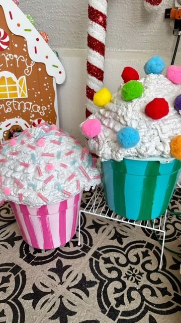 K a r e n G o v e r n a l e on Instagram: "🧁🎄 DIY Christmas delight! Created these adorable cupcake props using dollar store finds and spray foam magic! 🌟🎁 Who knew inexpensive items could turn into such cuteness? 😊✨ #DIYChristmasDecor #BudgetFriendlyCrafts #HolidayCreativity #DollarStoreDIY #candylandtheme #pinkchristmasdecor #diycupcakes #candychristmasdecor #christmasdecor #christmasmagic #candyland #candychristmas #christmas #cupcakediy #cupcakedecor #sweet #gingerbreadhouses #candylandparty #candychristmasdiy #gingerbreadhouse #candy #christmasdecorations #handmadechristmas #candyshop #pinkchristmas #gingerbreadhousedecorating #handmade #cupcakes #christmasdecorater #xmaswonderland" Diy Christmas Cupcakes Outdoor, Giant Candy Garland Diy, Cupcake Candy Decoration, How To Make Candy Props, Spray Foam Cupcakes, Candyland Christmas Ideas, Candy Land Party Food, Outdoor Cupcakes, Diy Outdoor Christmas Candy Decorations