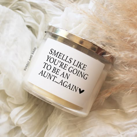 "Our \"smells like you're going to be an aunt...again\"  pregnancy announcement candle label will add the perfect touch to any pregnancy reveal gift! Simply place the label on your own candle and you'll have a cute personalized detail D E T A I L S * Listing is for label(s) only, no candles  * 3.75\" W x 2.375\"H  * New Weatherproof, vinyl material  * Label(s) come printed on a sheet, simply peel and stick to your candles We recommend removing the existing candle labels when possible for the best look or placing on the opposite side of the candle if there is no back label." Aunt Again Announcement, Telling Aunts And Uncles Your Pregnant, Will You Be My Auntie Announcement, Auntie Baby Announcement, Pregnancy Announcement To Aunt And Uncle, Surprise Pregnancy Reveal To Husband, Pregnancy Announcement To Aunt, Pregnancy Reveal To Parents, Diy Pregnancy Announcement