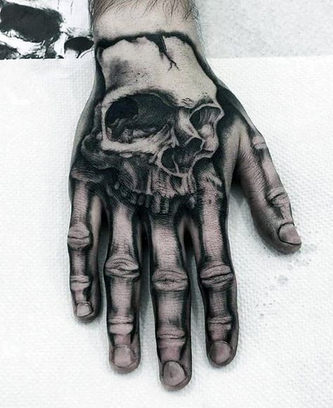 Skull With Hand Bones Guys Unique Hand Tattoos Unique Hand Tattoos For Men, Hand Tattoos For Men, Unique Hand Tattoos, Herren Hand Tattoos, Wörter Tattoos, Skull Hand Tattoo, Tattoo Placements, Tattoos Unique, Hand Tats