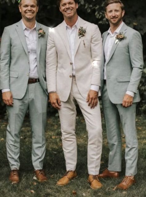 Cream And Sage Wedding Suit, Beige Tuxedo Wedding Groomsmen, Tan Groom With Grey Groomsmen, Tan Suits With Sage Green, Groom Suits For Wedding Beige, Tan Wedding Suits With Green, Smart Casual Groom Attire, Boho Wedding Attire For Men, Brown Suit Sage Green Tie