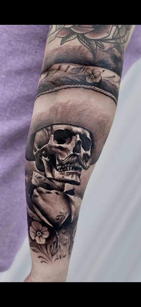 Mariachi skull by Faisal Al-lami @tattoo.sal #tattoos #skull #mariachi #mexican #art #tattoos #blackandgreytattoo Thigh Script Tattoo Men, Mexican Sleeve Tattoo Men, Ranchero Tattoo, Charra Tattoos Mexican, Mexican Sleeve Tattoo, Mexican American Tattoos, Skull Mariachi, Mariachi Tattoo, Mexican Heritage Tattoos