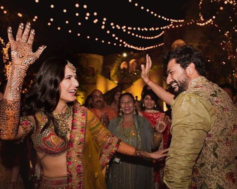 #Exclusive - Haldi & Mehendi ceremonies pictures of Newly wed B-Town couple Katrina Kaif & Vicky Kaushal. from Sabyasachi wedding outfits to beautiful couple portraits, these wedding photos are must seen. #shaadisaga #indianwedding #celebritywedding #bollywoodwedding #indiancelebrityweding #sabyasachilehenga #redsabyasachilehenga #bridalsabyasachilehenga #katrinakaifandvickykaushalwedding #katrinakaifandvickykaushalweddingpictures #katrinakaifandvickykaushalmarriage #katrinakaiflehenga शादी की तस्वीरें, Mehndi Outfit, Vicky Kaushal, Mehndi Ceremony, Haldi Ceremony, Bollywood Wedding, Wedding Function, Couple Dancing, 2022 Fashion