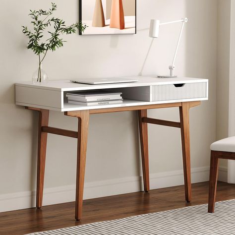 PRICES MAY VARY. Modern Mid-Century Charm: Enhance your workspace with this versatile writing desk, a perfect blend of mid-century aesthetics and modern functionality. Ideal as a small desk for any office or home setup. Stylish White Desk: Elevate your decor with this sophisticated white desk with drawers. Its sleek design and solid wooden legs make it an impressive addition to any space. Functional & Compact: Enjoy ample workspace without compromising on room space. This office desk offers prac Mini Corner Desk, Small Desk With Shelves, Desk For Apartment, White Desk Bedroom, Skateboard Desk, Office Desk For Home, Mid Century Modern Office Desk, Wooden Computer Table, White Desk With Drawers