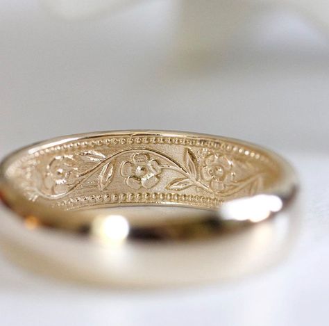 This 14k yellow gold ring is 6mm wide and domed on the outside. It features my petunia pattern on the inside. The five-petaled flowers and their leafy vine weave their way around the band. This is a great traditional band on the outside made to match a companion ring with the same pattern outside.  It's a great ring for everyday wear. A wonderful, heirloom-quality wedding band that can one day be passed down to the next generation. Also available in 14k rose gold and 14k white gold. Please note, Ring With Flowers, Floral Wedding Band, Sakura Wedding, Flower Wedding Band, Romantic Wedding Rings, Non Traditional Wedding Ring, Traditional Wedding Rings, Traditional Wedding Bands, Floral Wedding Ring