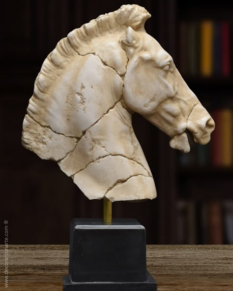 Reproduction of an ancient horse head, sculpture made of molded marble (marble powder bonded with resins). Application of aging patinas based on natural earth, giving it the finish of a sculpture embellished by the passage of time. Art and archaeological reproductions. Handmade in Spain. Sculptures ideal for decoration and gift. Measurements: Measurements of the figure plus the base: Height: 31 cm (12.2 inches). Width: 21 cm (8.3 inches). Depth: 10 cm (3.9 inches). Approximate weight: 2.5 kg (5.5 pounds). In this sculpture, we reproduce a horse head inspired by statues from classical antiquity. Art reproductions, such as this sculpture, help us bring the beauty of classical art to the decoration of our homes. Sculpture Art Classic, Horse Sculpture Clay, Horse Head Statue, Horse Head Sculpture, Classic Sculpture, Horse Statue, Head Sculpture, Head Statue, Classical Antiquity