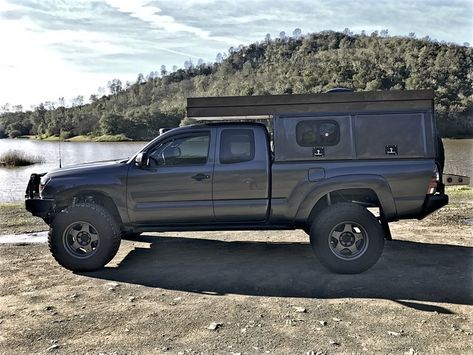 Click this image to show the full-size version. Tacoma Tent, Tacoma Camper Shell, Toyota Camper, Truck Camper Shells, Tacoma Accessories, Tacoma Mods, Toyota Tacoma 4x4, Tacoma 4x4, Truck Bed Camping