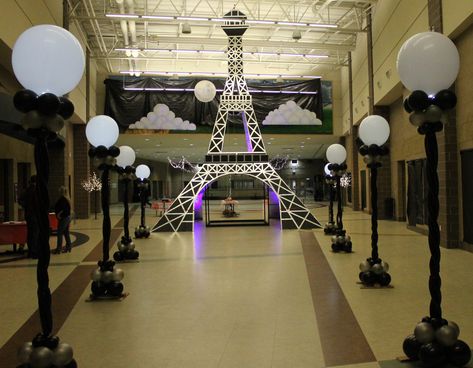 30' Eiffel Tower and balloon lamp posts created  for an evening in Paris themed dance. Masquerade In Paris Theme, Paris Themed Decorations, Paris Lamp Post, Night In Paris Dance Theme, An Evening In Paris Theme Party, Paris Themed Dance, Paris Prom Theme Decorations, Night In Paris Homecoming, Paris Dance Theme