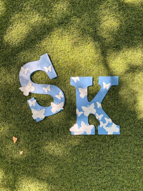 Sigma Kappa Letters Painted, Sorority Letter Painting Ideas, Sorority Wooden Letters Decorated, Butterfly Big Little Reveal, Greek Letters Painted Sorority, Sorority Letter Painting, Sorority Letter Designs, Wooden Butterfly Painting Ideas, Sorority Letters Painted Wooden Big