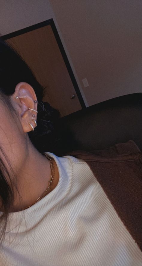 Triple ear lobes, conch, low cartilage, and forward helix #earrings #earpiercing #earpiercingideas #jewelry #fashion #cute #cuteearpiercings Piercings Forward Helix Ear, Triple Ear Piercing Ideas, Low Helix Piercing, Helix Piercing Ideas, Triple Ear Piercing, Triple Lobe, Ear Piercing Ideas, Forward Helix Earrings, Apple Watch Fashion