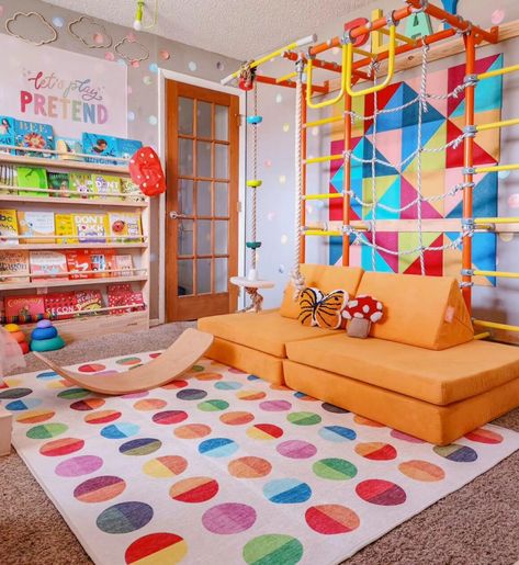 15 Playroom Decor Ideas Kids Will Love | Mummy Time Rainbow Playroom Decor, Playroom Ideas Sensory, Cheap Playroom Makeover, Playroom Ideas Age 7, Mural For Playroom, Basement Sensory Gym, Playroom For Grandkids, Primary Color Playroom, Garage To Playroom Conversion