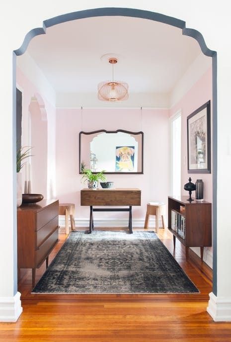 House Tour: A Small Southern Style Brooklyn Home | 525-square-foot Brooklyn apartment is sleek, simple and has just the right amount of Savannah, Georgia-inspired Southern quirkiness. Archways In Homes, Brooklyn Apartment, Foyer Decorating, Brown Furniture, Small Entryway, Hall Design, Entry Hall, Architectural Features, A Living Room