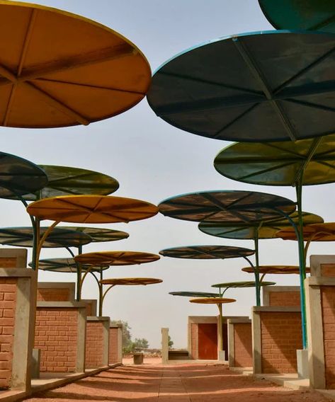 atelier masomi uses colorful metal canopies to build dandaji market in niger Desert Climate, Best Architecture, Big Building, French Colonial, Canopy Design, Metal Canopy, Natural Ventilation, Co Design, Architecture Project