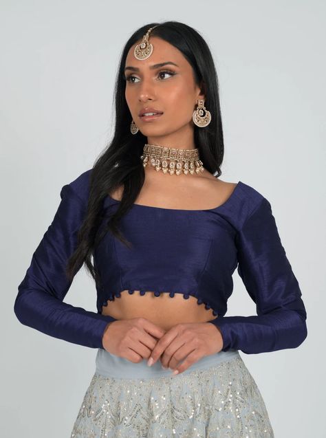 Pastel Prairies Collection. U-Neck. U-back. Cut Sleeve. Silk Composition.The Navy Long Sleeve Pom Blouse is designed with elegance and versatility in mind. The small pom poms bordering the front and back of the blouse add texture and style to th... Navy Blue Blouse Designs, South Asian Fashion, Blue Blouse Designs, Fashionable Saree Blouse Designs, Navy Blue Blouse, Perfect Blouse, Awesome Blouse, Blouse Models, Pretty Blouses