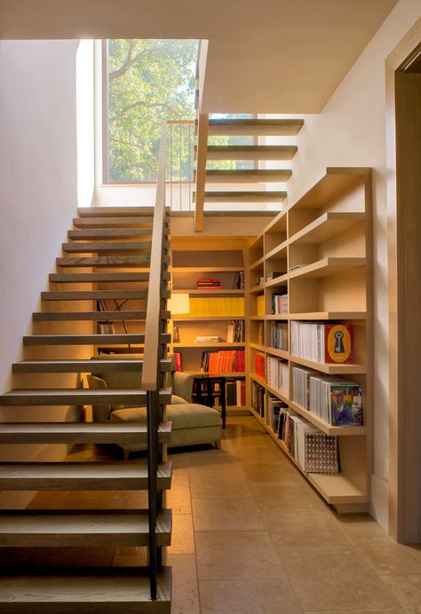 Cozy Up! How to Create the Ultimate Reading Nook | QualityBath.com Discover Open Staircase To Basement, Office Under Stairs, Stair Design Architecture, Space Under Stairs, Open Trap, Open Stairs, Open Staircase, Stair Remodel, Floating Stairs