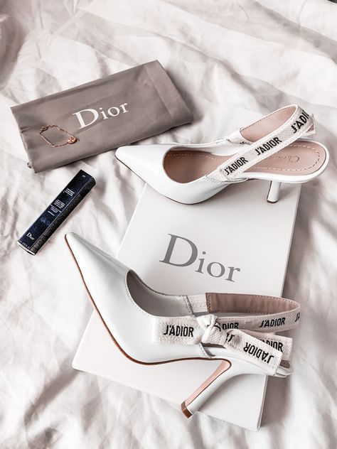 Purchased these beautiful white Dior heels for the end of summer! These will pair beautifully with any dress or neutral colored outfit :) I can't wait to share outfits I wear with this! #dior #diorslingback #luxury #luxuryheels #designer #designerheels #whiteheels #jadior #slingback #luxuryapparal Dior Boots, Hak Tinggi, Louis Vuitton Shoes Heels, Ivory Shoes, Trending Boots, Aesthetic Shoes, White Heels, Dior Shoes, Patent Leather Heels