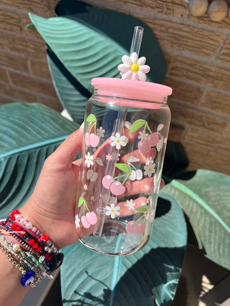 16oz Glass cup Straw and lid Made with UVDTF (permanent)  Hand wash only  FREE STRAW CHARM! Uses For Plastic Bottles, Vasos Vintage, Spring Cups, Kawaii Cups, Tattoo World, Trendy Water Bottles, Cute Coffee Cups, Cute Water Bottles, Pretty Mugs