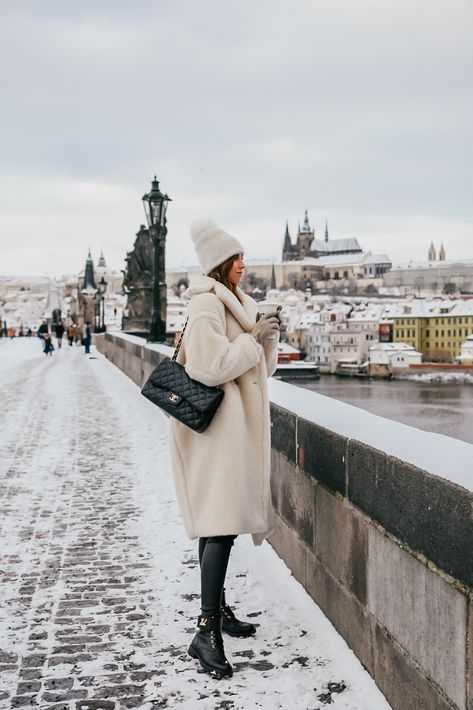 TEDDY BEAR IN SNOWY PRAGUE Winter Outfits Prague, Prague Winter Fashion, Prague Outfit Winter, Prague Winter Outfit, Prague Outfit, Prague Winter, Max Mara Coat, Louis Vuitton Boots, White Coat