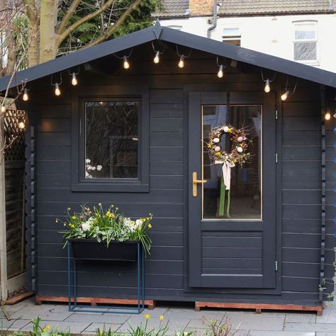 Black She Shed, Black Summer House, Black Garden Shed, Dark Grey Shed Ideas, Dark Grey Shed, Garden With Shed, Black Garden Cabin, Garden Shed Black, Garden Shed Decor