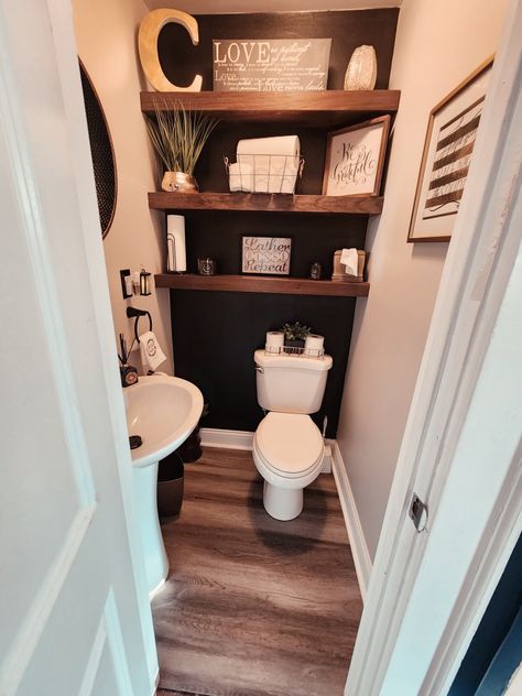 Powder room make over Black Accent Wall Bathroom Half Baths, Black Feature Wall Bathroom, Black Wall In Bathroom Ideas, Bathroom Ideas With Accent Wall, Small Bathroom Accent Wall Behind Toilet, Half Bath Wood Wall, Black Accent Bathroom Wall, Half Bath Black Accent Wall, Black Wall Behind Toilet