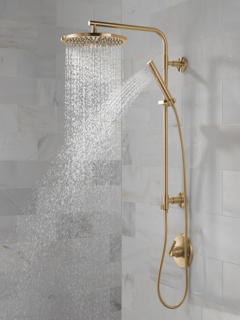 Emerge® 26~ Round Shower Column in Lumicoat® Champagne Bronze 58820-CZ-PR | Delta Faucet Showers With Brass Fixtures, Soft Brass Bathroom Fixtures, Gold Shower Head And Faucet, Shower Head System, Brass Shower Fixture, Delta Champagne Bronze Bathroom Showers, Gold Lighting Bathroom, Master Shower Faucet Ideas, Shower Fixtures And Hardware Ideas