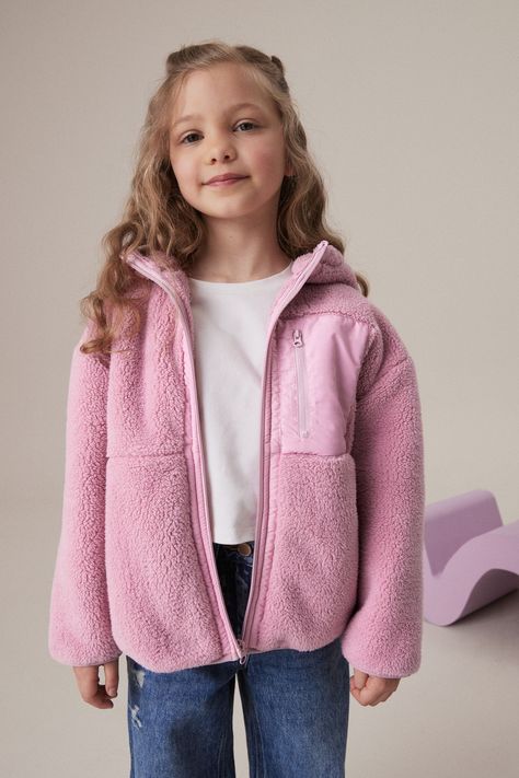 This layering staple is made from cosy borg fleece with a soft feel, featuring a contrasting panel to the chest with a zippered pocket, a full-zip fastening and a large set-in hood. Machine washable. Main 100% Recycled polyester. Trim 100% Polyester. Dress Flip Flops, Pink Fleece, Kids Fleece, Petite Jeans, Wedding Guest Dress Summer, Set Outfit, Swimwear Cover Ups, Swimsuit Shops, Swimwear Cover