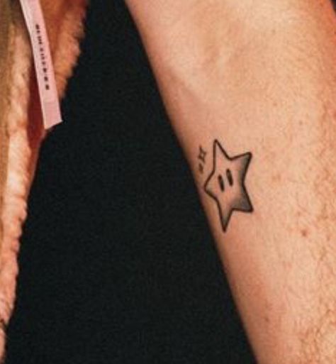 star from the Mario games Super Mario Tattoos, Mario Super Star Tattoo, Nintendo Star Tattoo, Super Mario Star Tattoo, Video Games Tattoo, Roblox Tattoo, Mario Kart Star Tattoo, Small Mario Tattoo, Mario Tattoos