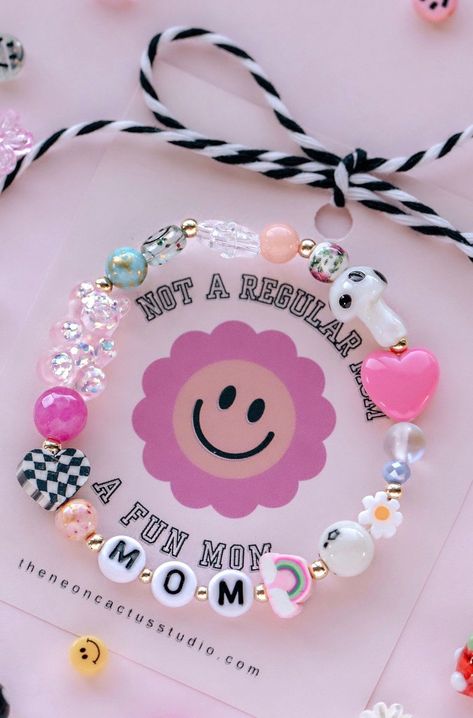 Where are my Fun Moms at?? Each bracelet includes an assortment of fun filled beads as pictured. Bracelet will say Mom unless you make a different request in box below. Most are random but feel free to list any special requests in comments such as colors,etc and we will try to incorporate.  Average adult wrist size is 7".  All items are handmade in the USA! Fun Mom, Mama Bracelet, Mom Bracelet, Jewelry Making Classes, Moms Bracelet, Diy Bracelet Designs, Cool Mom, Beads Bracelet Design, Bracelet Diy