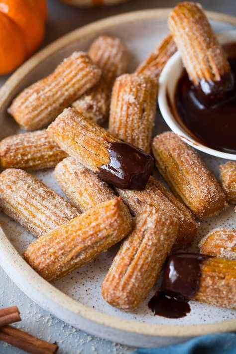 Baked Pumpkin Churros Pumpkin Churros, Amazing Thanksgiving Desserts, Baked Stuffed Apples, Caramel Dipping Sauce, Easy Thanksgiving Dessert Recipes, Churro Bites, Salty Caramel, Churros Recipe, Thanksgiving Desserts Easy