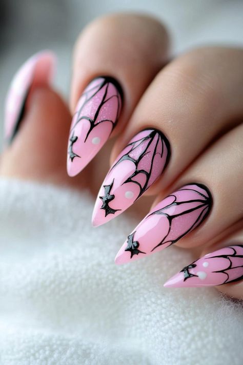 17 Gorgeous Pink Halloween Nails That Break Tradition Pink And Blue Halloween Nails, Nails Pink Halloween, Black Pink Halloween Nails, Neon Pink Halloween Nails, Pink Vampire Nails, Halloween Neon Nails, Pink Halloween Nail Designs Short, Light Pink Halloween Nails, Pastel Goth Nail Art