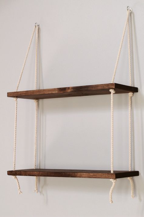 "Wooden Hanging Plant Shelf - Hanging Shelves 2 Tier- Plant Hanger- 2 Tier Planter | Rope Shelves This 2 Tiered Hanging Window Plant Shelf is the perfect addition to your home décor! Hang on the wall or use it as a window shelf to give your plants direct sunlight! Check out our 3 tier shelves here: https://www.etsy.com/listing/999290229/tiered-wall-shelf-tiered-hanging-shelf?ref=shop_home_active_4&crt=1 Works great as a plant hanger or a bookshelf! These hanging wall shelves are the perfect Window Plant Shelf, Hanging Rope Shelves, Window Shelf, Dry Wall, Diy Hanging Shelves, Window Shelves, Window Plants, Modern Wall Shelf, Shelf Hanging