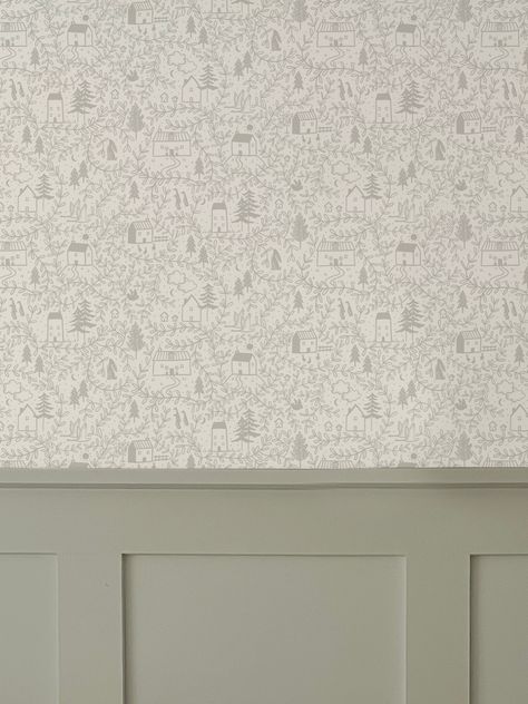 Cottages in the Woods Luxury Wallpaper is an intricate lineal hand illustrated design featuring whimsical cosy cottages surrounded by leafy foliage. Pairs beautifully with wall panelling. It also works as pretty cupboard or draw lining. • Printed to order in the UK on coated, non-woven traditional parchment wallpaper with a matte finish.• We recommend ordering a sample to check colours as they can vary on screens.• Please see below for more details and information on how to hang and care for you Nursery Woodland Wallpaper, Half Panel Half Wallpaper Nursery, Wood And Wallpaper Accent Wall, Nursery In Small Bedroom, Cottage Wall Panelling, Kids Room Wall Panelling, Nursery Accent Wall Wallpaper, Nursery Panelling And Wallpaper, Gender Neutral Wallpaper Nursery