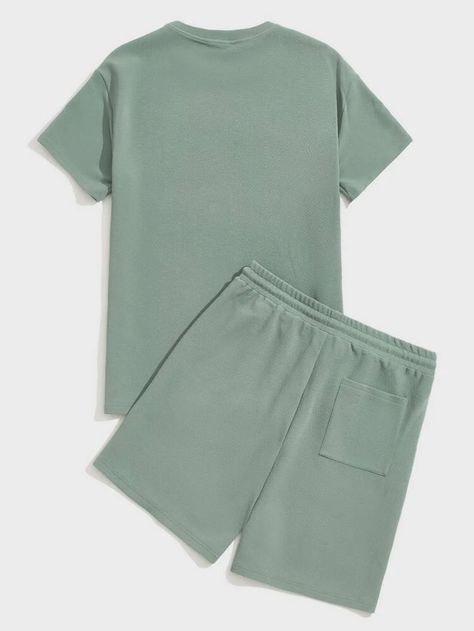 SHEIN Men Solid Top & Seam Front Track Shorts Set | SHEIN USA Mens Holiday Clothes, Dapper Mens Fashion, Polo Shirt Outfits, 2piece Outfits, T Shirt Crop Top, Plain Shorts, Men Stylish Dress, Track Shorts, Streetwear Men Outfits