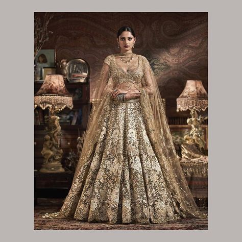 Rimple & Harpreet Narula on Instagram: “RAH Tribe | On Kritika, a gold-ivory tulle and silk lehenga. The skirt features floral motifs layered over a sequin encrusted ground,…” Rimple Harpreet Narula, Rimple Harpreet, Lehenga Green, Rimple And Harpreet Narula, New Year Fashion, Gold Lehenga, Mehndi Dress, Shadi Dresses, Desi Outfits