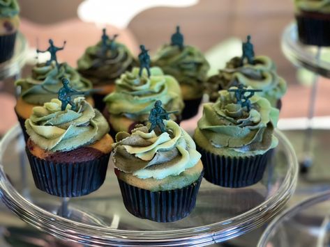 Camo cake batter baked in camo cupcake liners with camo buttercream icing topped with army men displayed at a Tour Number Four birthday party cake and food table Army Men Cupcakes, Army Theme Cupcakes, Army Birthday Cupcakes, Army Bday Cake, Army Cupcakes Ideas, Army Men Cake, Army Themed Cake, Army Cupcakes, Camouflage Cupcakes