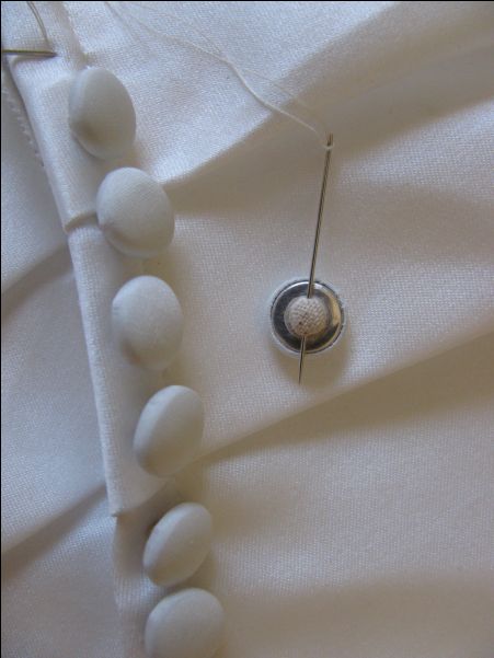 I admit I don’t get a request to sew on satin covered buttons very often. It’s happened twice in eight years. You’ve seen these before, right? They are usually seen on wedding dre… 1950 Dress, Best Knots, Wedding Dress Alterations, Diy Wedding Dress, Soft Tailoring, Dress Alterations, Couture Sewing Techniques, The Button, Sewing Blogs