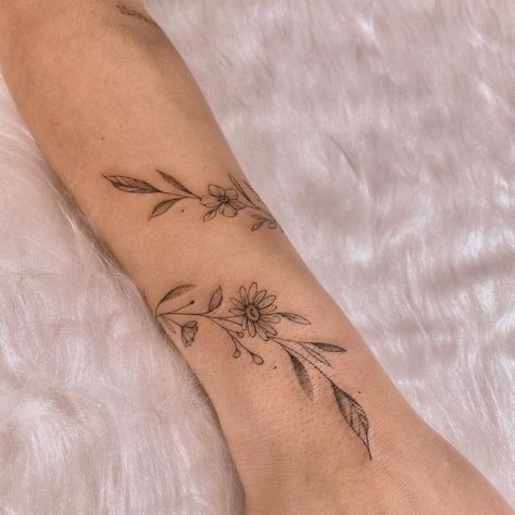 Floral Vine Wrist Tattoos For Women, Wrap Around Sunflower Wrist Tattoos, Sunflower Tattoo With Vines, Dainty Forearm Wrap Around Tattoo, Vine Tattoo With Sunflower, Sunflower Vines Tattoo, Sunflower Wrap Tattoo, Lavender Arm Wrap Tattoo, Wrap Around Forearm Tattoo Women Flowers