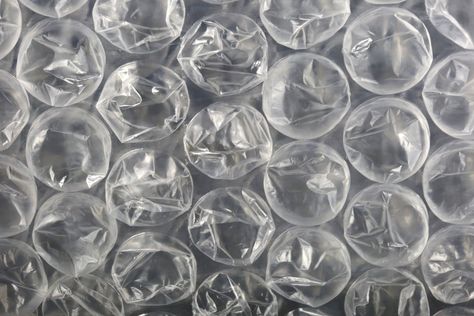 It's Not Just For Popping! 11 Surprising Uses for that Roll of Bubble Wrap Picnic Wraps, Wooden Train Track, Tree Seedlings, Clean Fridge, Bubble Paper, Padded Hangers, Types Of Acne, Long Car Rides, Readers Digest