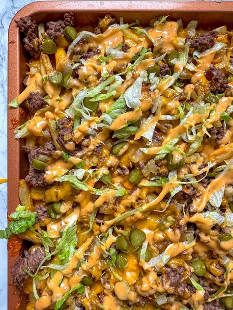 Big Mac Loaded Fries - These simple big mac loaded fries make such a delicious snack or meal. The french fries are baked in the oven until crisp and them topped with ground beef, onions, cheese, lettuce, pickles, and a delicious sauce. They are perfect to enjoy with your friends or share with your family. Big Mac Nachos Recipes, Loaded Burger Fries, Big Mac Fries Recipe, French Fries Meals Dinners, French Fries Toppings, Vegetarian Loaded Fries, Deconstructed Big Mac, Green Chili Fries, Loaded Cheeseburger Fries