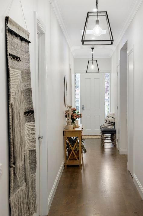 Inside a Stunning Australian Hamptons Home that Nails the Look Australian Hamptons Style, Hamptons Lighting, Herringbone Tile Bathroom, Hamptons Living Room, Hamptons Interior, Foyer Light, Styl Hampton, Hamptons Home, Entrance Lighting