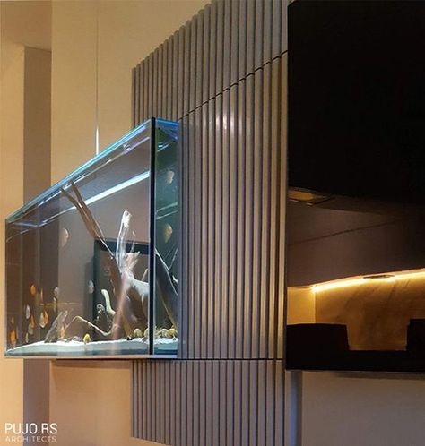 Wall Fishtank Ideas, Interior Design Fish Tank, Fish Tank Wall Aquarium Design, Fish Tank On Wall, Living Room Aquarium Ideas, Wall Fish Tank Ideas, Wall Aquarium Living Rooms, Fish Aquarium Ideas For Living Room, Home Aquarium Living Rooms