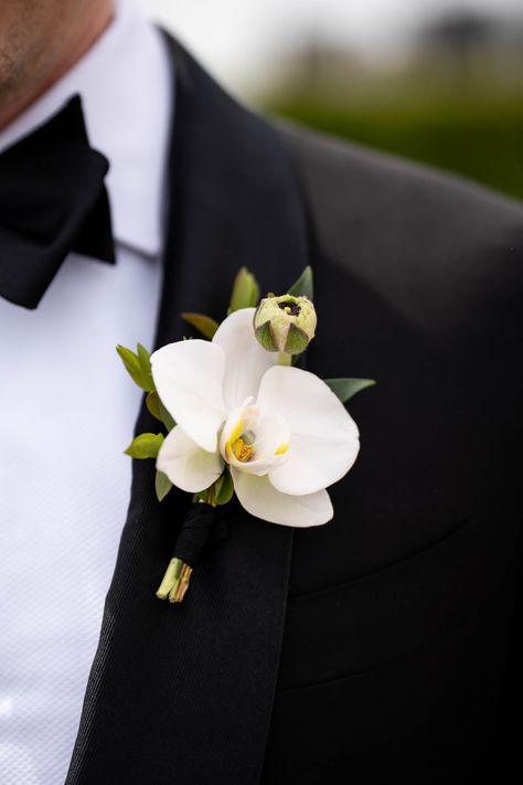 Orchid Boutonniere for Devon. Flowers: @rosehipsocial Bride Flower Bouquet Orchid, Orchid Groom Boutonniere, Wedding Flowers With Orchids, Wedding Orchids Centerpieces, White Roses And Orchid Bouquet, Orchid Buttoniere, Orchid Boutineer, Orchid Boutonniere Wedding, Wedding Bouquets Orchids