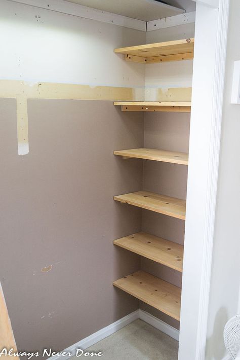 Make the most out of small closet spaces by adding shelving into 'dead spaces' on the sides of the closet space. This would be great for storing handbags. Tip use tension rods instead. Small Master Closet, Cheap Closet, Front Closet, Small Closet Space, Tiny Closet, Closet Remodel, Small Closets, Small Closet Organization, Kid Closet