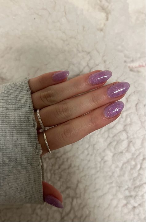 Purple Shimmer Nails Acrylic, White And Purple Sparkle Nails, Nails For A Light Purple Dress, Pink Purple Sparkle Nails, Sparky Purple Nails, Purple Sparkle Almond Nails, Sparkly Purple Almond Nails, Purple Nails Shiny, Light Purple Glittery Nails