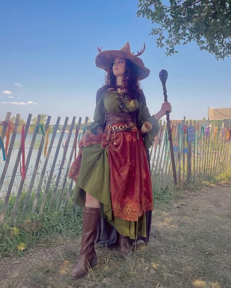 I love casting spells 🔮✨😌 📸 shoutout to @anmariluna for these magical pics!! 🧡 #witch #renfaire #magicstaff #renaissancefestival #witchhat #witchcosplay #fantasy #fantasycosplay #witchy #witchcraft #cosplay Witchy Fantasy Outfits, Colorful Ren Faire Outfit, Wizard Cosplay Female, Witch Renfaire Outfit, Witch Cosplay Ideas, Wizard Costume Women, Ren Faire Outfits Witchy, Witch Ren Faire, Renfaire Inspiration