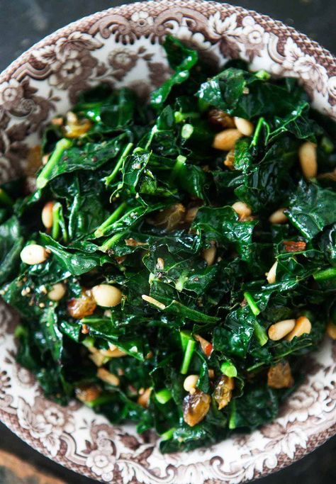 Wow! Sautéed Greens with Pine Nuts and Raisins. Recipes like these make it too easy to eat healthy! #healthyeating #healthyrecipe #recipes  www.sallingtate.com Collard Greens With Bacon, Cooking Spinach, Collard Greens Recipe, Raisin Recipes, Swiss Chard Recipes, Sauteed Greens, Chard Recipes, Resep Salad, Sauteed Kale