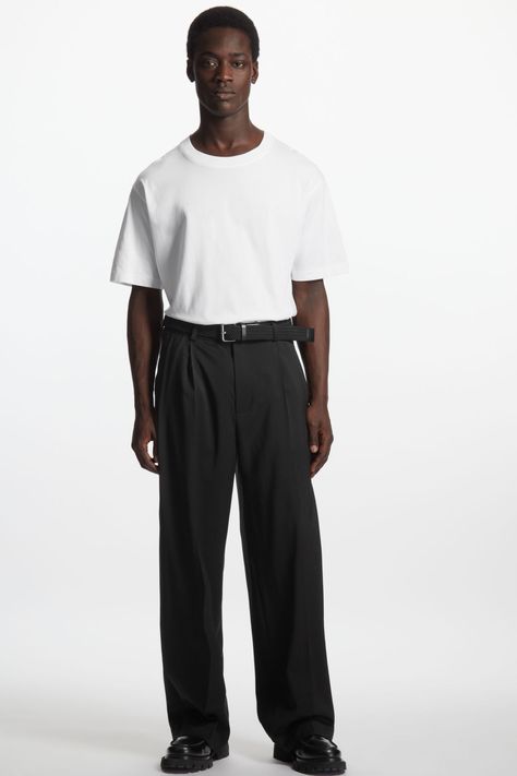 These wide-leg pants have been responsibly crafted from wool. They are elevated with slanted side pockets and back welt pockets. The top pleats, pressed creases and back darts provide a flattering fit.- Full length - Concealed hook and bar closure100% RWS Wool / Dry cleanInside leg length of size 32R is 31" Black Wide Trousers Outfit, Wide Leg Trousers Men, Mens Pleated Trousers, Vietnam Tailor, Pleated Pants Outfit, Tailored Pants Outfit, Wide Leg Pants Men, Trousers Outfit Men, Mens Pleated Pants