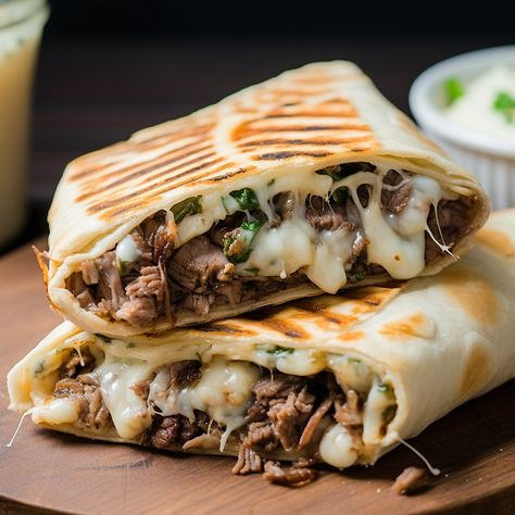 A delicious and easy-to-make grilled wrap filled with all the flavors of a Philly Cheesesteak sandwich. Cheesesteak Wrap Philly, Steak And Cheese Wraps, Cheesesteak Wrap, Steak Wraps Recipes, Roast Beef Wrap, Blade Roast, Cheesesteak Sandwich, Steak Wraps, Steak And Rice